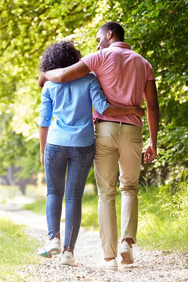 MOTS-c-Peptide-Treatment A healthy black couple take a nice stroll on a trail. Get MOTS-c Peptides for metabolism and weight loss from Better Life Carolinas of Mount Pleasant in Charleston Metro.