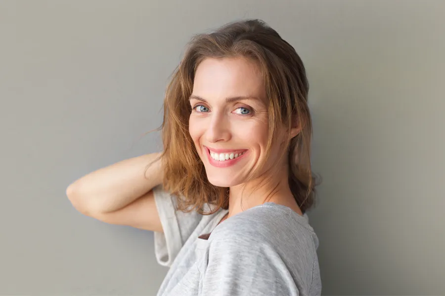 Womens-Health-Clinic-3 A beautiful brunette woman touching her hair. Schedule a women's health consultation from Better Life Carolinas of Mount Pleasant in Charleston Metro.